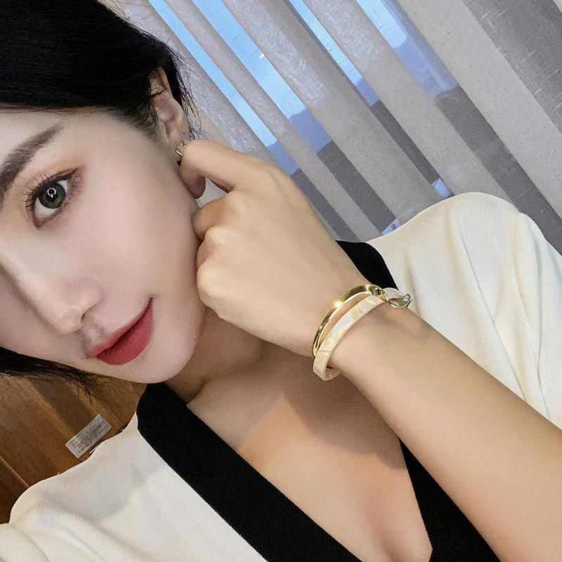 SHELL PLATED GEOMETRIC BANGLE